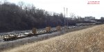 String of PHMX cars asleep on the north Airline track east of 35th St.